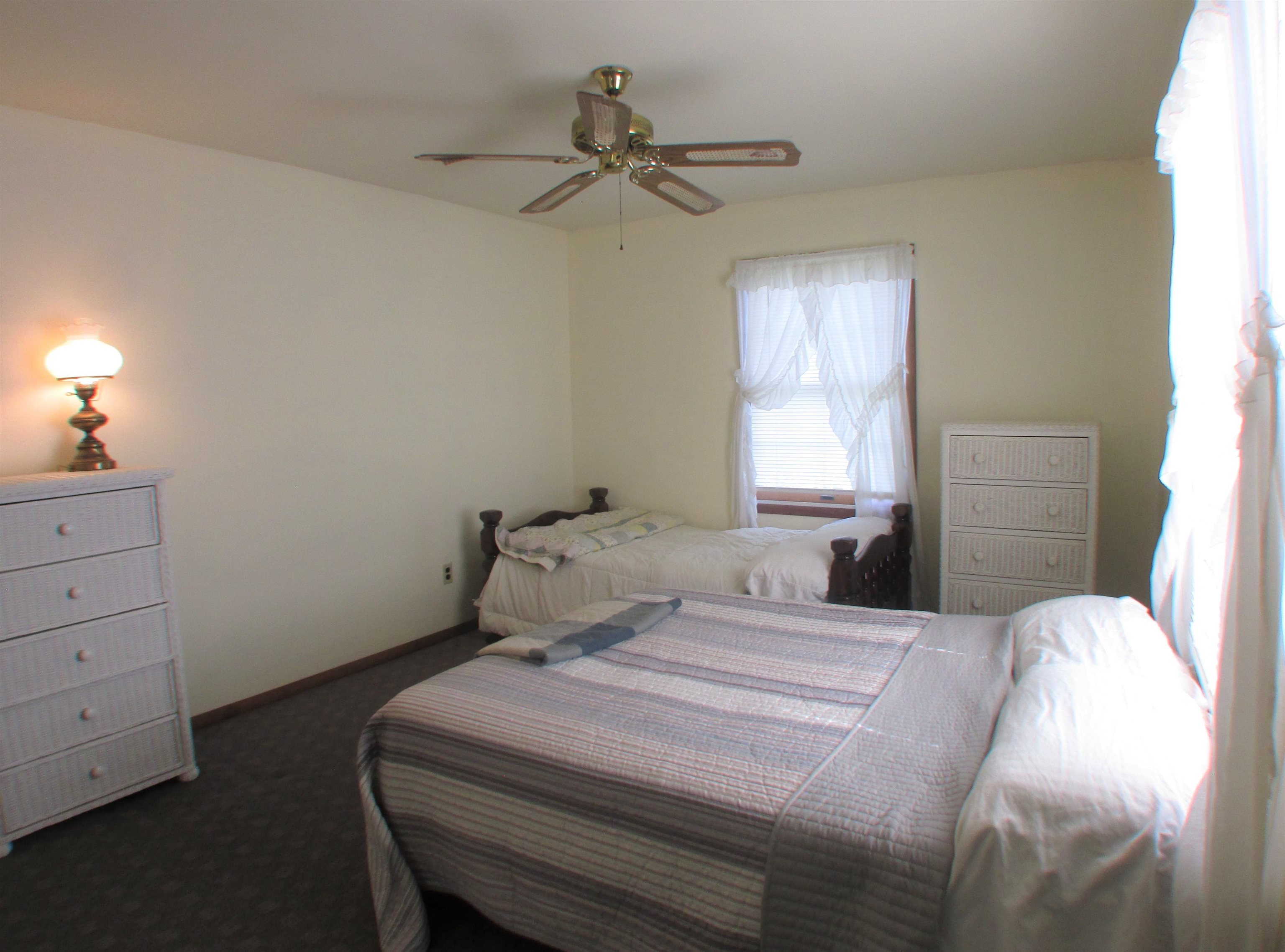 101 Kenvil Road North Cape May, NJ 08204 - Photo 18 of 27 a bedroom with a bed and a window