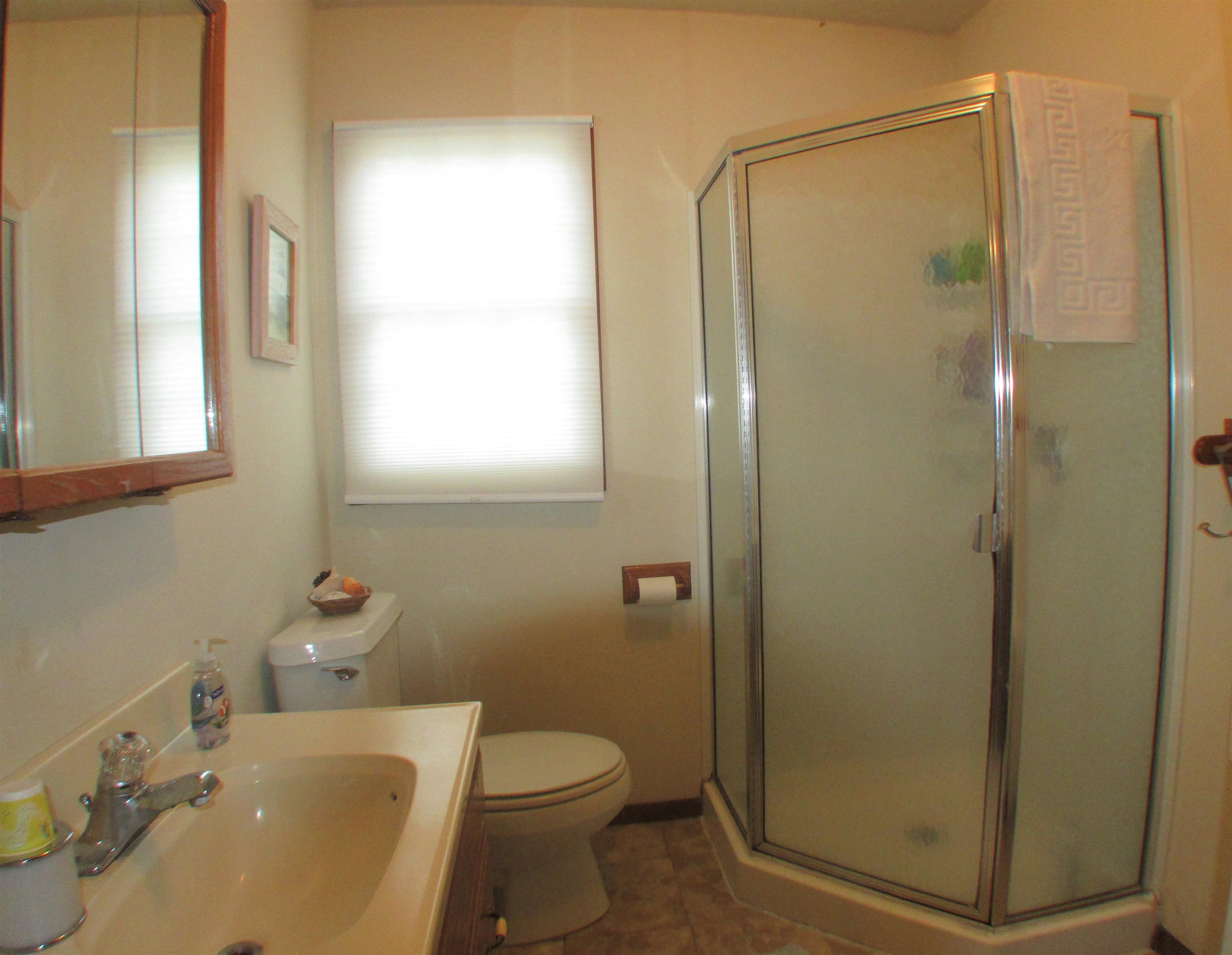 101 Kenvil Road North Cape May, NJ 08204 - Photo 22 of 27 a bathroom with a shower a sink and a toilet