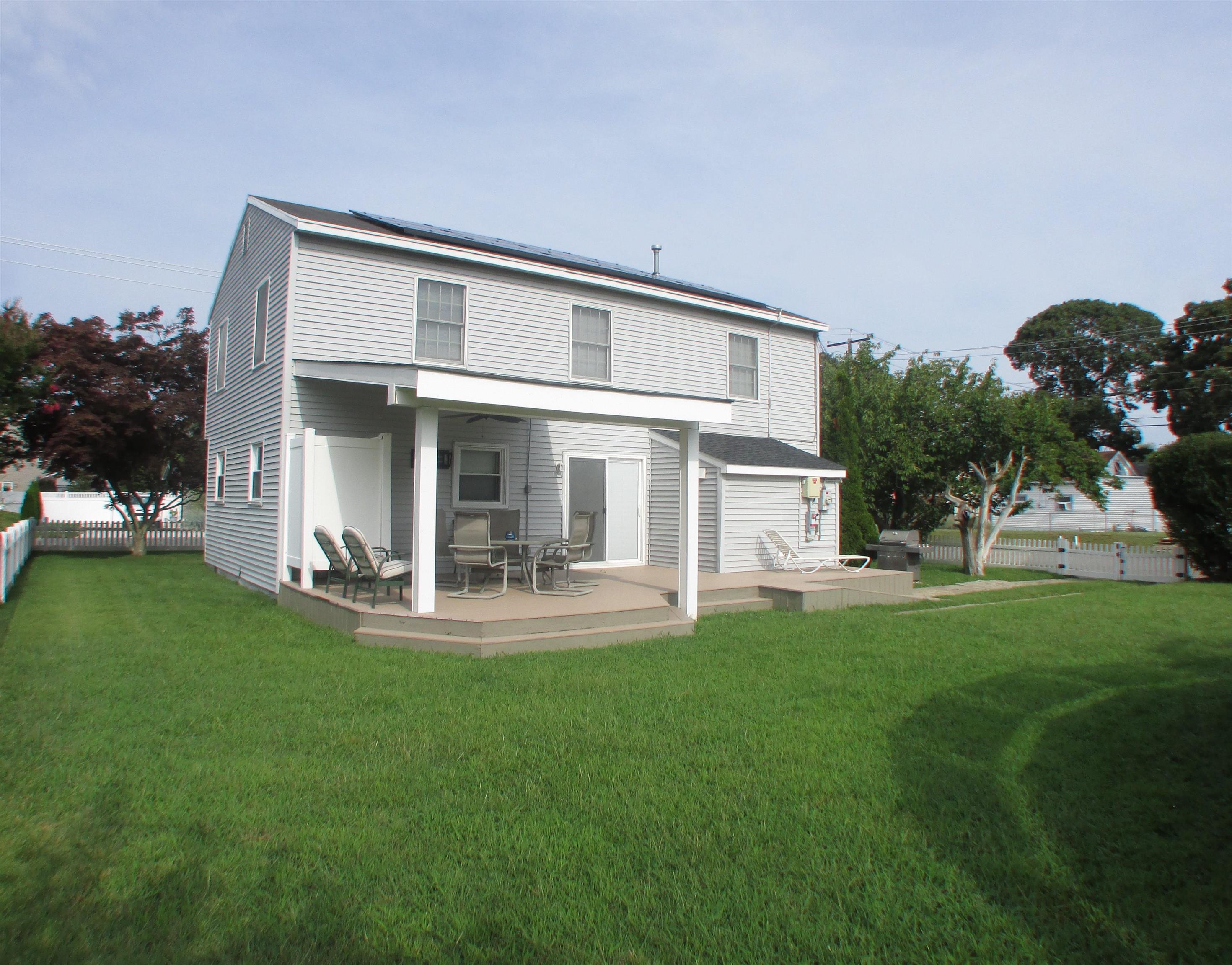 101 Kenvil Road North Cape May, NJ 08204 - Photo 24 of 27 a front view of house with yard and outdoor seating