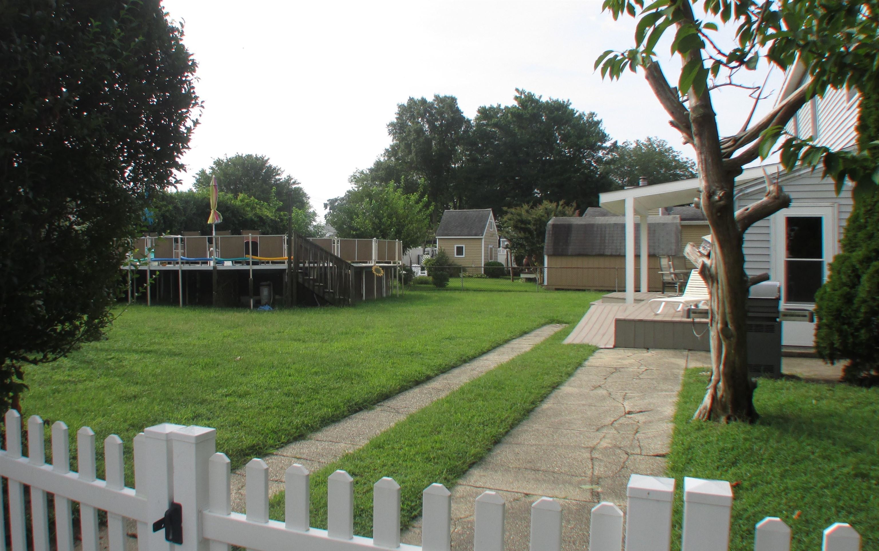 101 Kenvil Road North Cape May, NJ 08204 - Photo 27 of 27 a front view of a house with garden