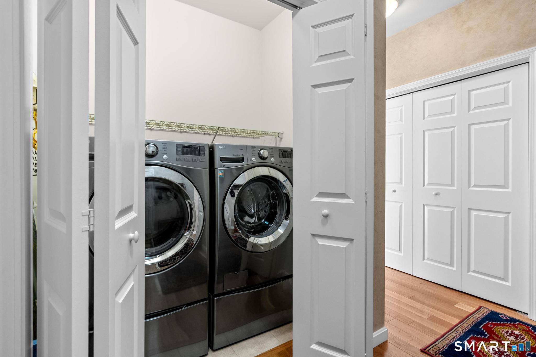 31 Gooseberry Road Suffield, CT 06078 - Photo 29 of 33 a view of a hallway with washer and dryer