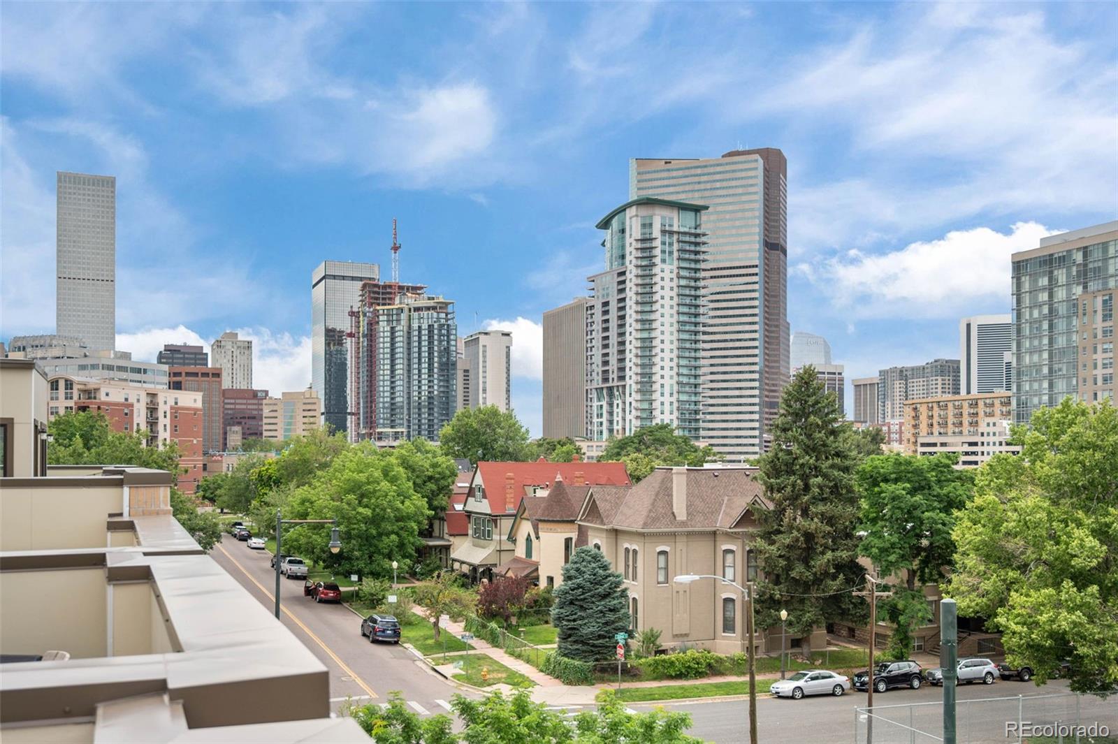 2200 Tremont Place, Unit 5 Denver, CO 80205 - Photo 21 of 22 a city view with tall buildings