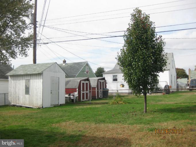 5 Fairway Road Baltimore, MD 21221 - Photo 8 of 10 a view of a house with a yard and tree s