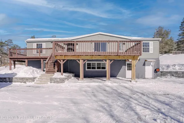 a view of pool with seating space