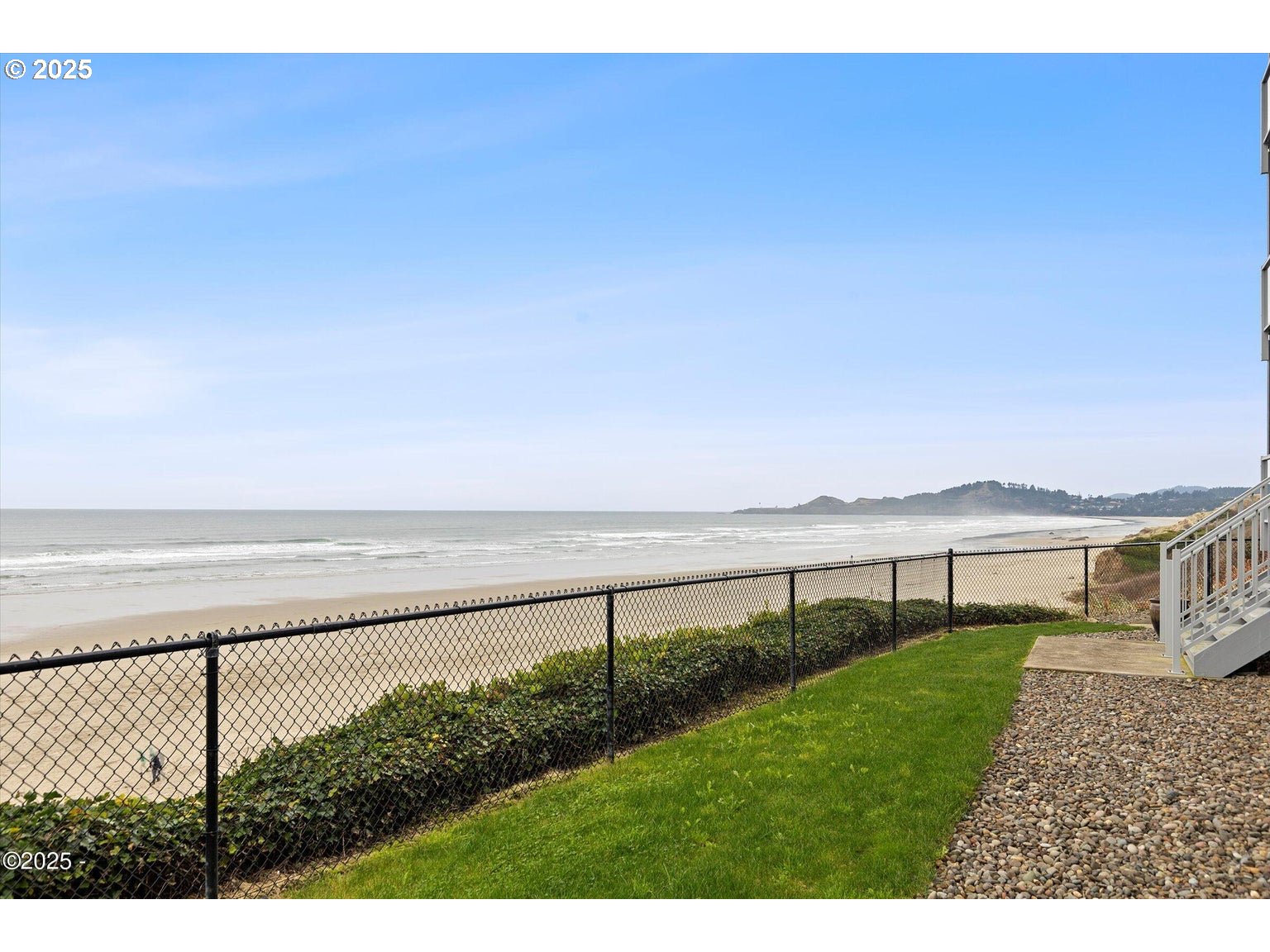 507 Northwest Alpine Street, Unit 204 Newport, OR 97365 - Photo 23 of 30 a view of a terrace with a garden