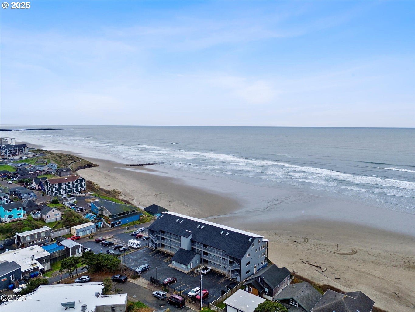 507 Northwest Alpine Street, Unit 204 Newport, OR 97365 - Photo 25 of 30 an aerial view of beach and ocean