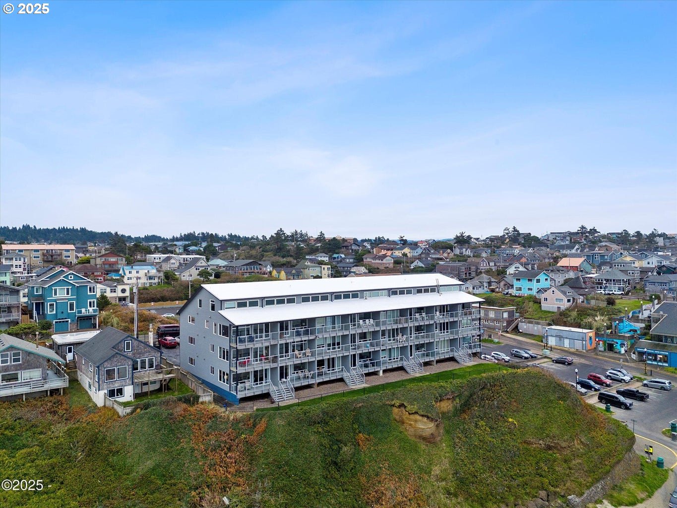 507 Northwest Alpine Street, Unit 204 Newport, OR 97365 - Photo 30 of 30 a view of a city that has tall buildings