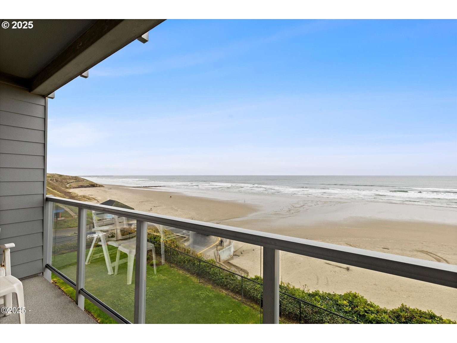 507 Northwest Alpine Street, Unit 204 Newport, OR 97365 - Photo 7 of 30 a view of an ocean and beach