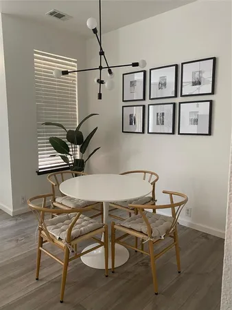 a workspace with furniture and window