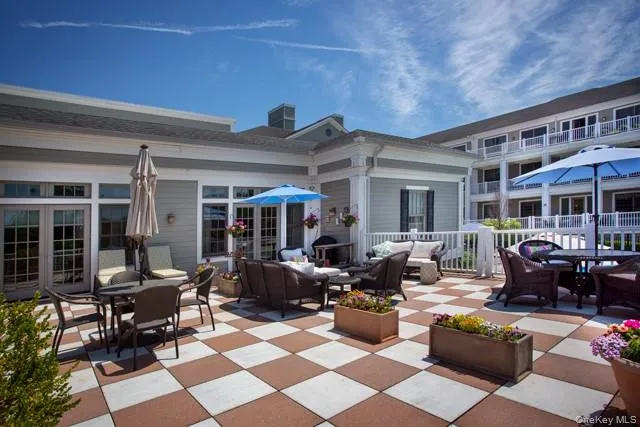 a building outdoor space with patio furniture