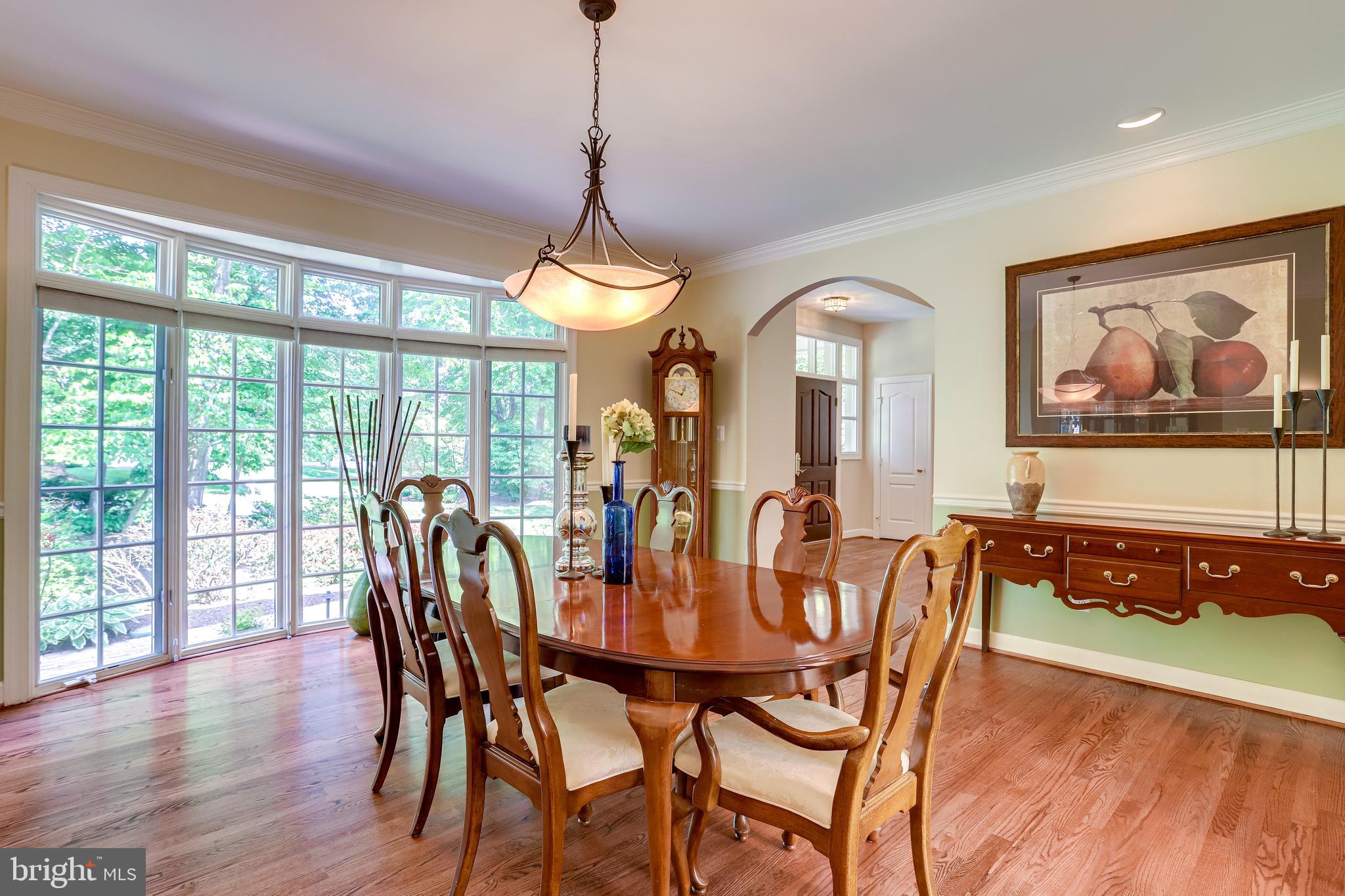 11315 Bright Pond Lane Reston, VA 20194 - Photo 22 of 56 How beautiful are the windows in the dining room?