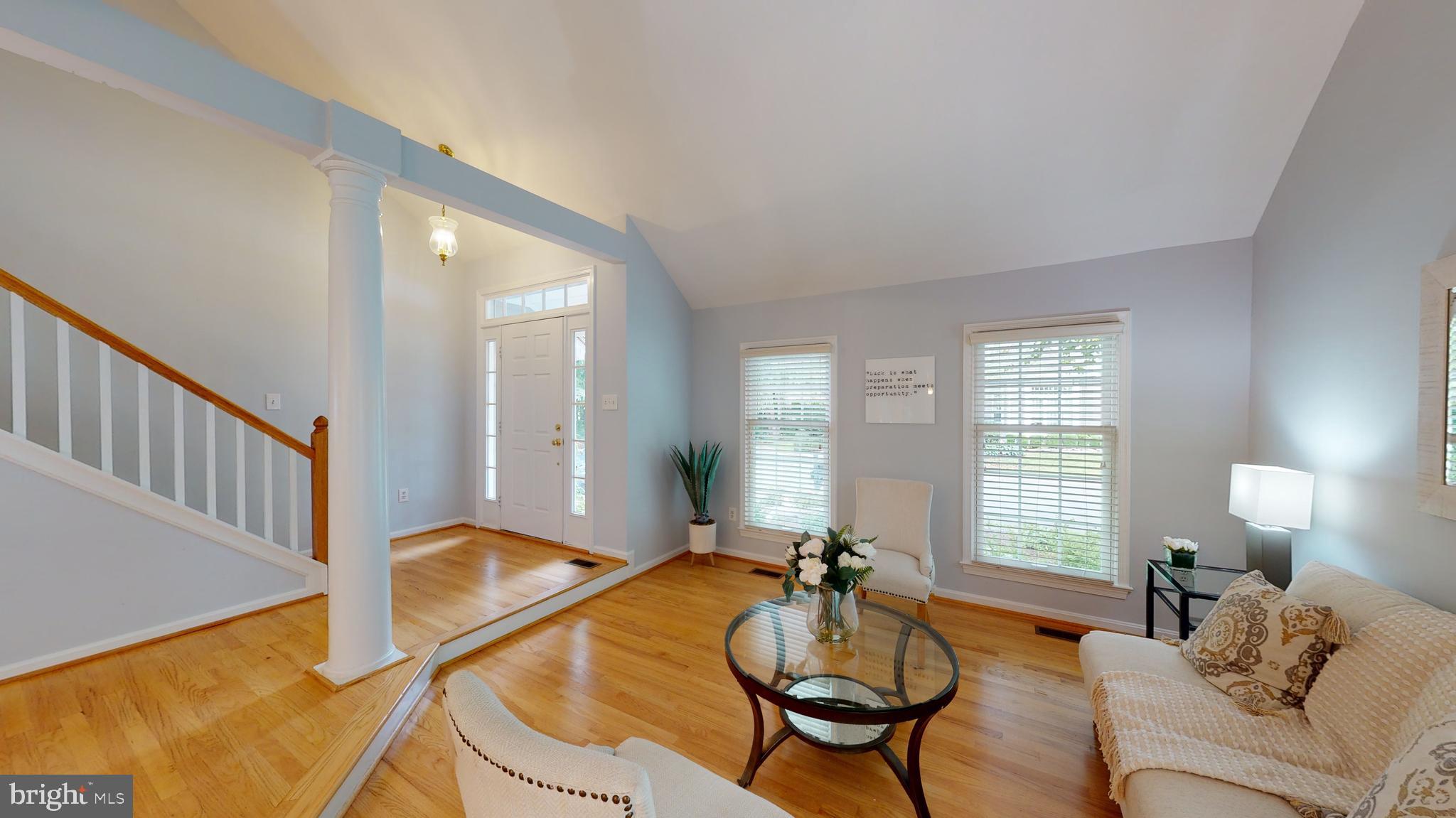 11609 Springhouse Place Reston, VA 20194 - Photo 11 of 41 Living Room with Vaulted Ceiling.