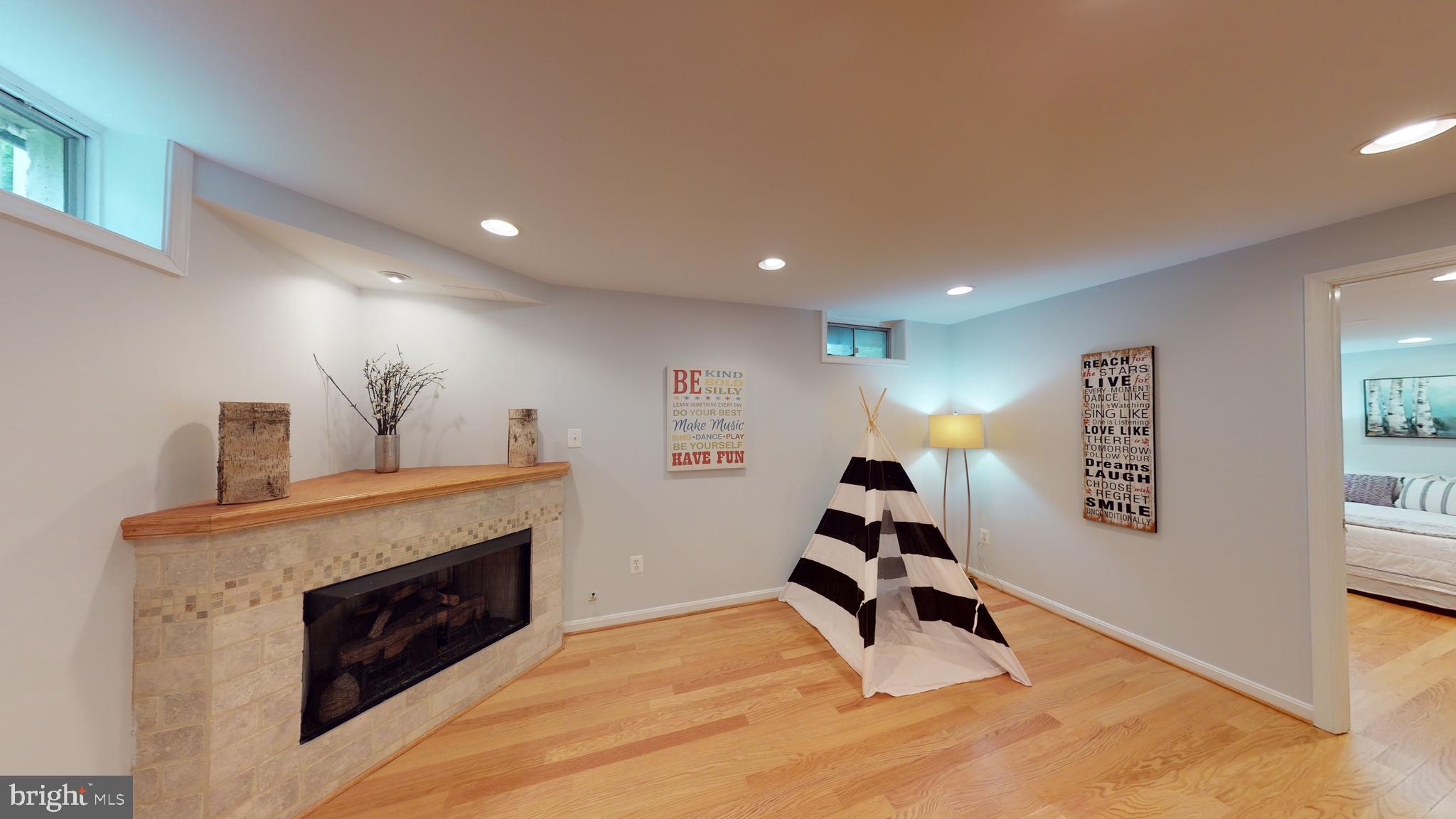 11609 Springhouse Place Reston, VA 20194 - Photo 23 of 41 Electric Fireplace in Recreation Room.