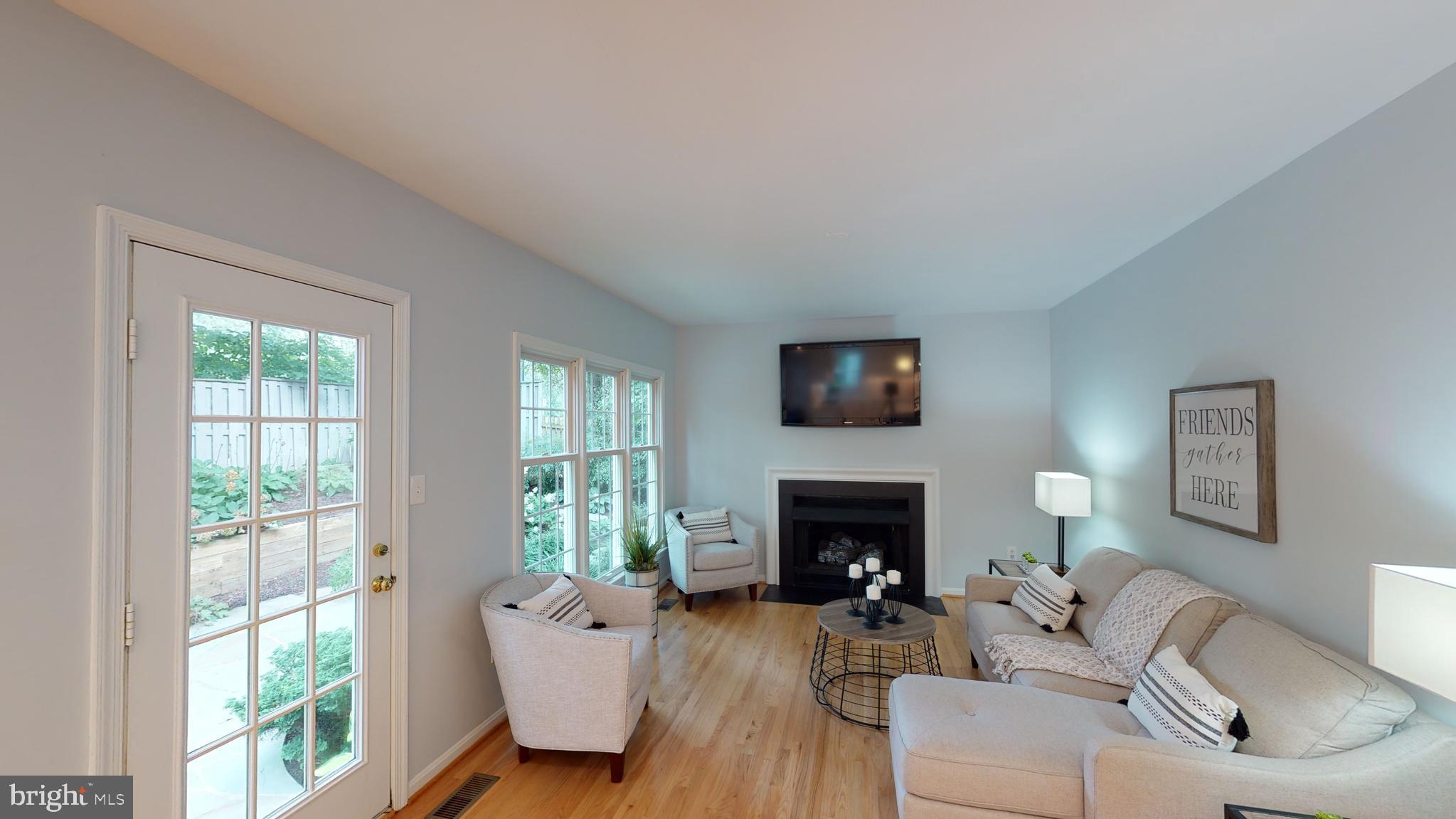 11609 Springhouse Place Reston, VA 20194 - Photo 7 of 41 Family Room with Access to Patio.
