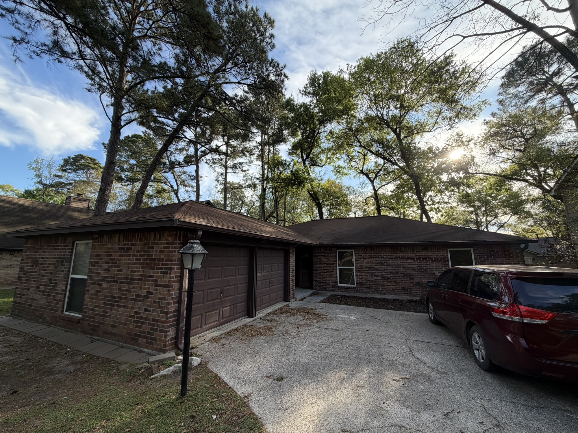 70 Brookflower Road Spring, TX 77380 - Photo 13 of 16 a view of a car parked in garage