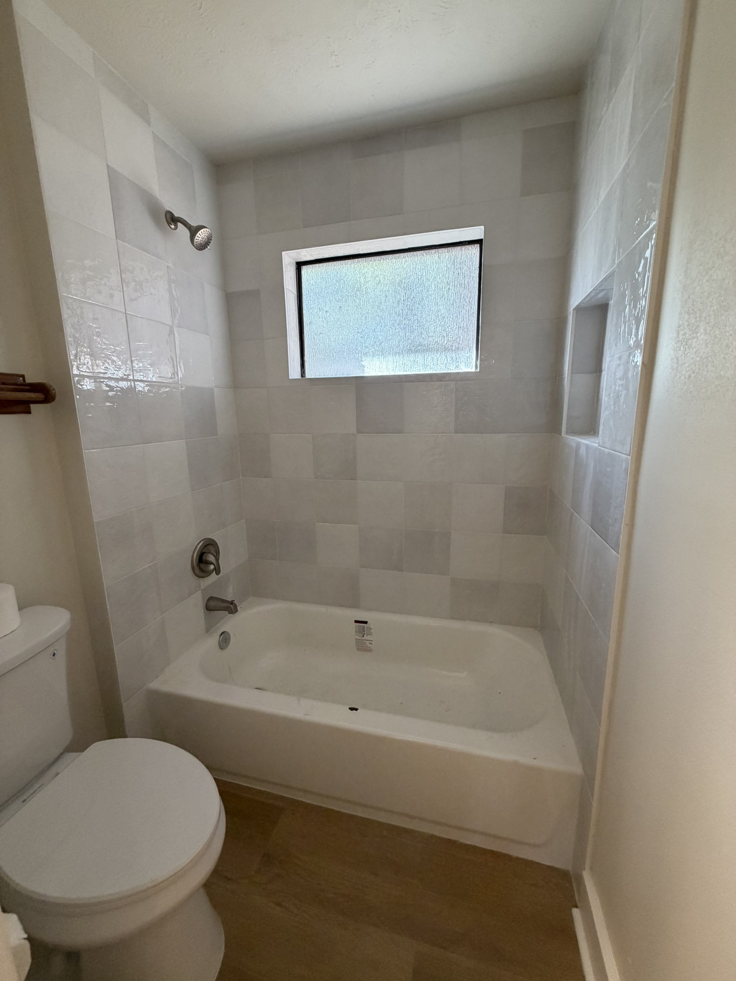 70 Brookflower Road Spring, TX 77380 - Photo 6 of 16 a white toilet sitting next to a bath tub
