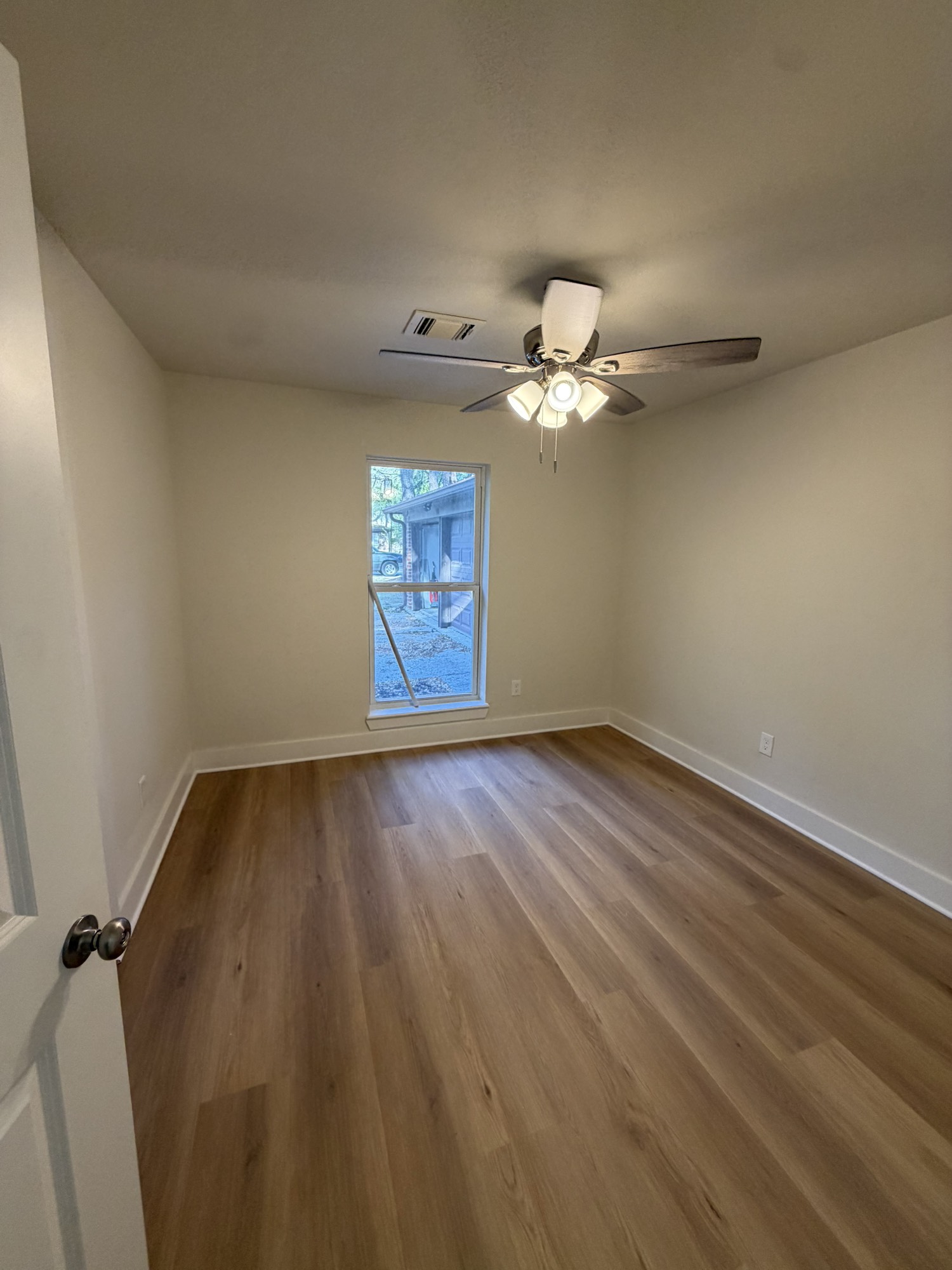 70 Brookflower Road Spring, TX 77380 - Photo 8 of 16 wooden floor in an empty room