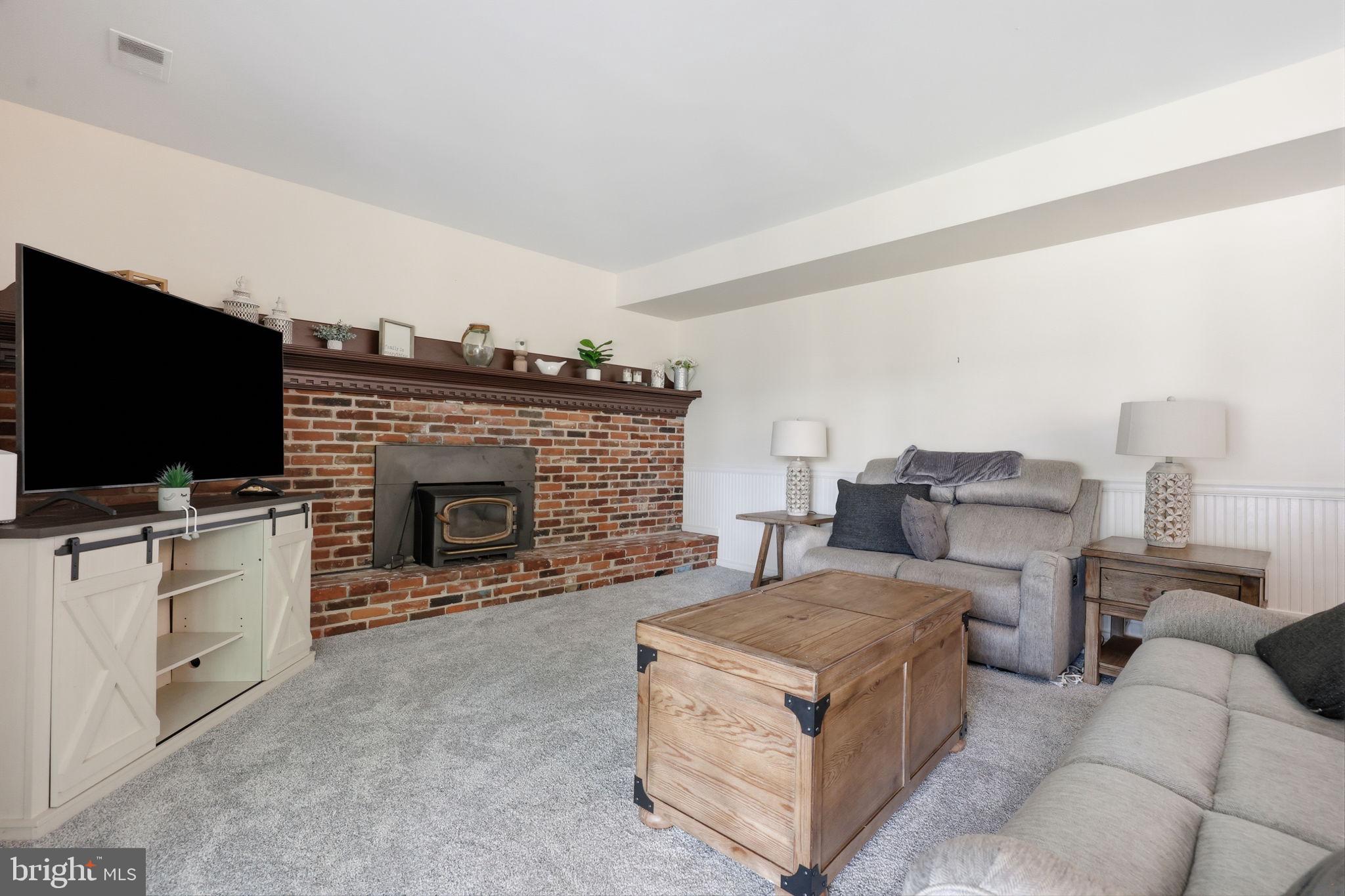 1140 Charter Road Warminster, PA 18974 - Photo 13 of 37 Cozy living space with rustic charm.