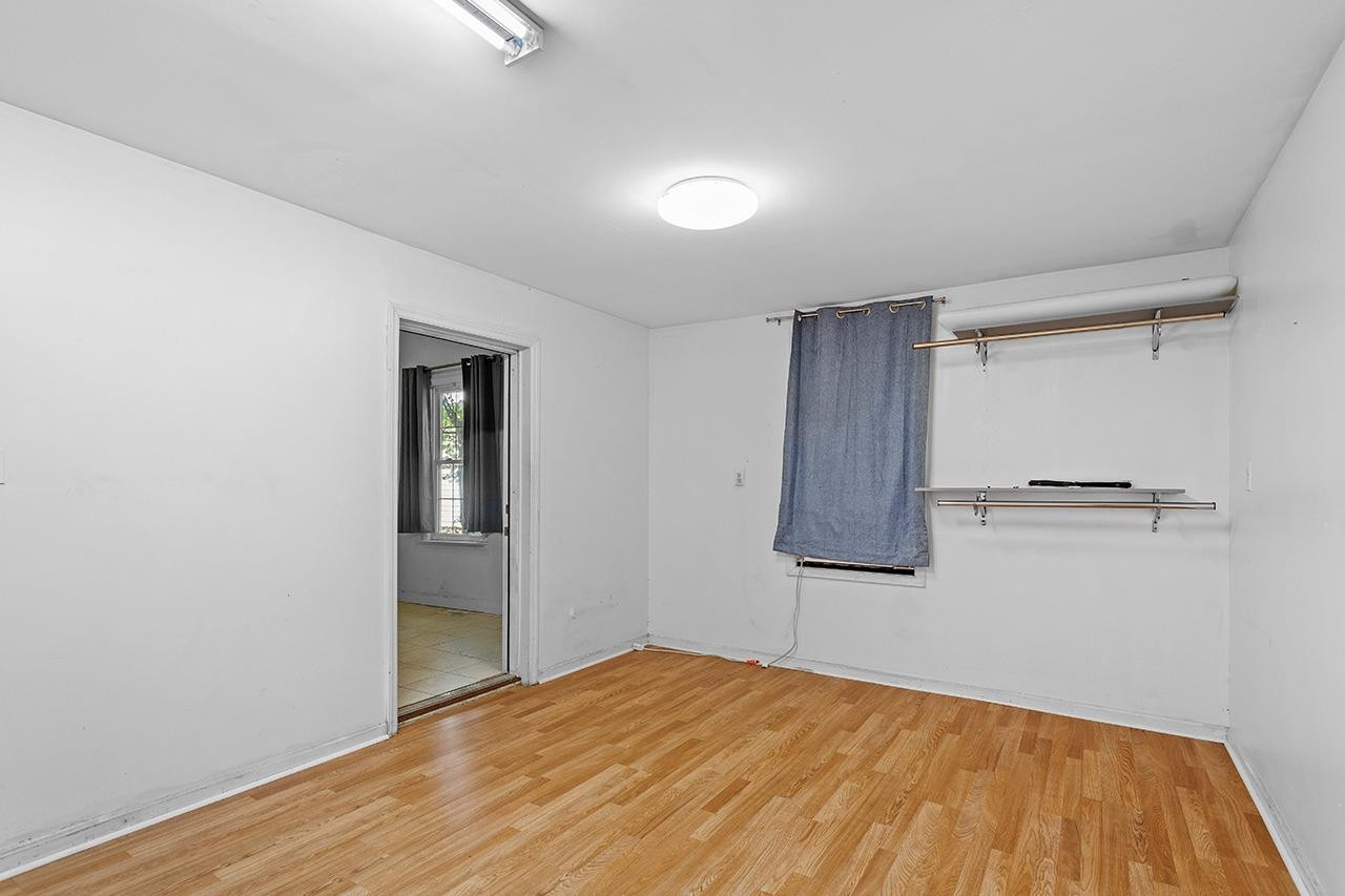 24 Dixie Trail Raleigh, NC 27607 - Photo 20 of 38 a view of a room with wooden floor and closet