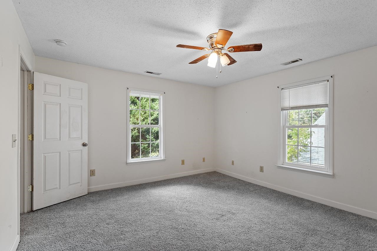 24 Dixie Trail Raleigh, NC 27607 - Photo 29 of 38 a view of an empty room with a window