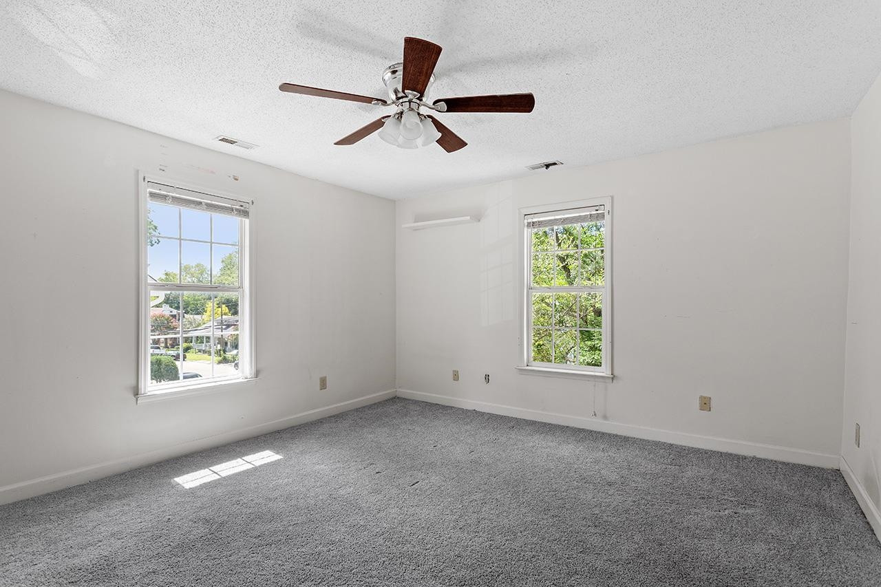 24 Dixie Trail Raleigh, NC 27607 - Photo 34 of 38 a view of an empty room with a window