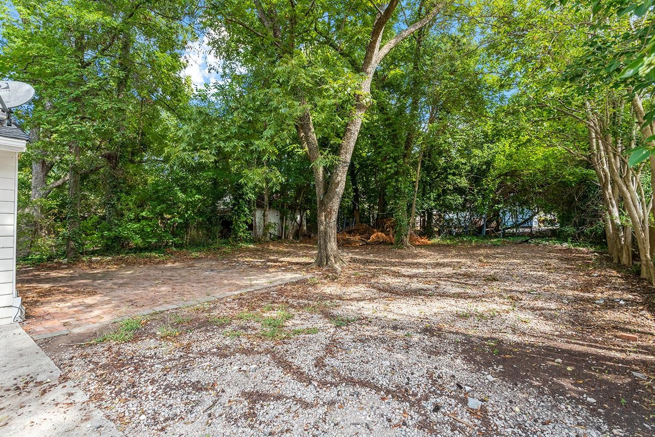 24 Dixie Trail Raleigh, NC 27607 - Photo 37 of 38 a view of outdoor space with trees