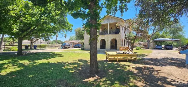 a view of a house with a park