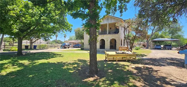 a view of a house with a park
