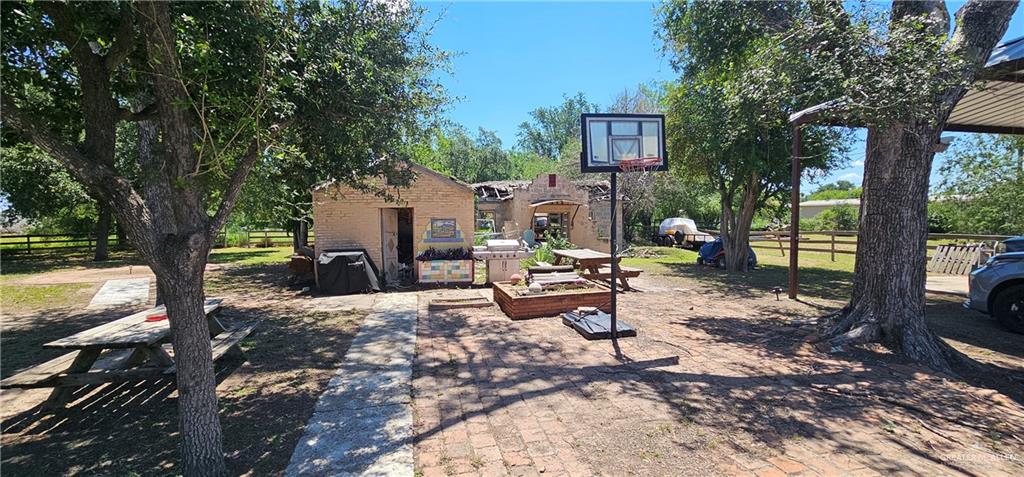 3220 North Taylor Road McAllen, TX 78501 - Photo 6 of 8 a view of a backyard with sitting area