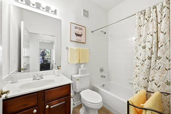 a balcony with trees in front of it