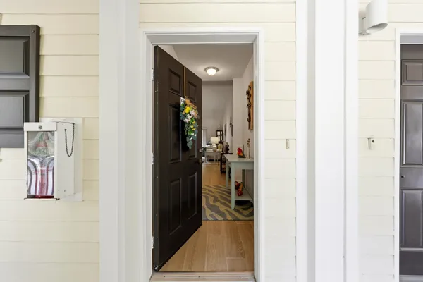 a kitchen with stainless steel appliances granite countertop a stove top oven a sink dishwasher and a microwave oven on the blue kitchen countertops