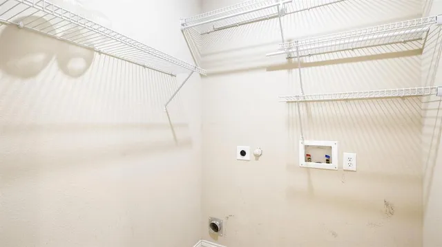 a bathroom with a shower and a shower