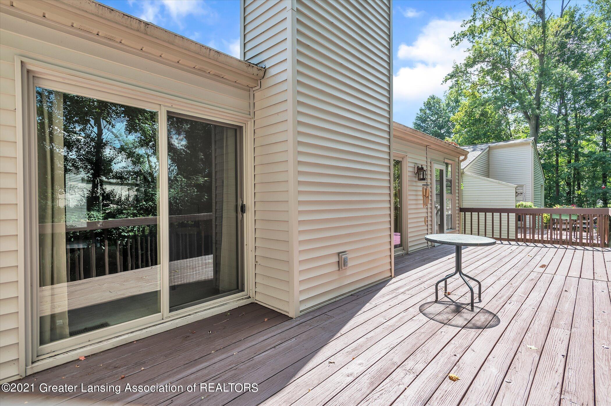 7014 North Ridge Road, Unit 20 Lansing, MI 48917 - Photo 38 of 40 38-7014-N-Ridge-Dr-WindowStill-Real-Esta