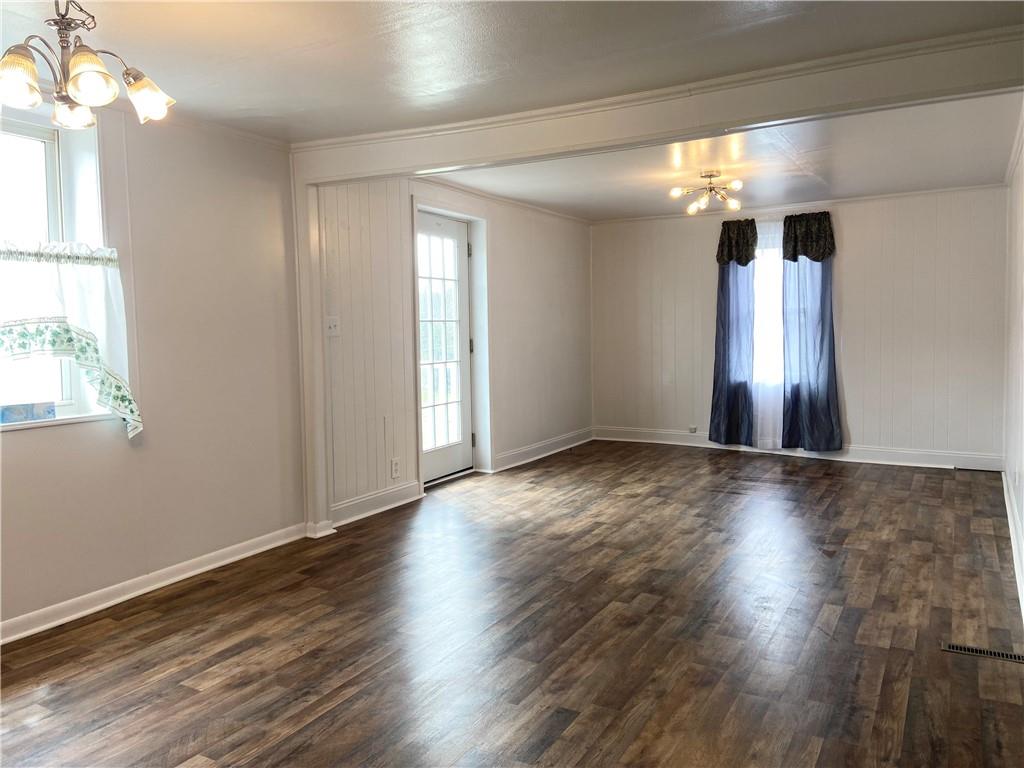 4319 Rte 908 Natrona Heights, PA 15065 - Photo 14 of 24 a view of an empty room with wooden floor and a window