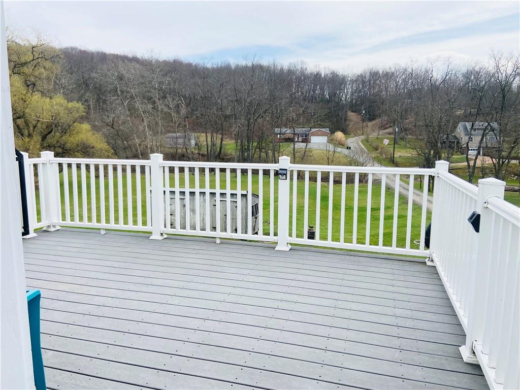 4319 Rte 908 Natrona Heights, PA 15065 - Photo 17 of 24 a view of a balcony with wooden fence