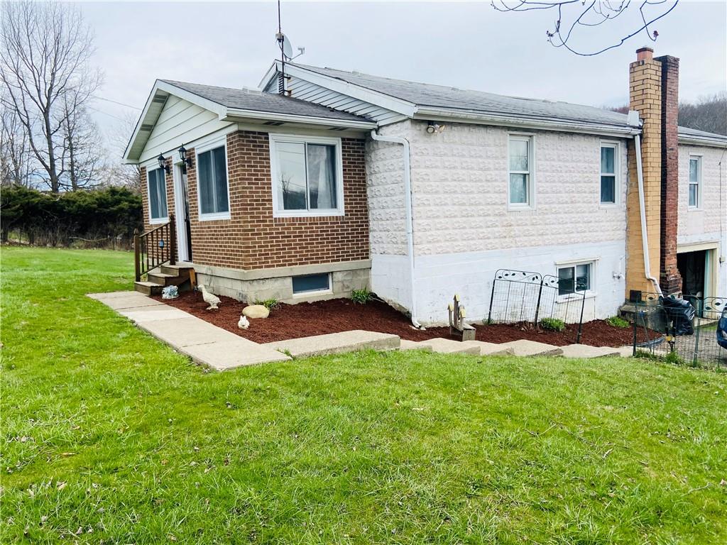 4319 Rte 908 Natrona Heights, PA 15065 - Photo 4 of 24 a front view of house with yard