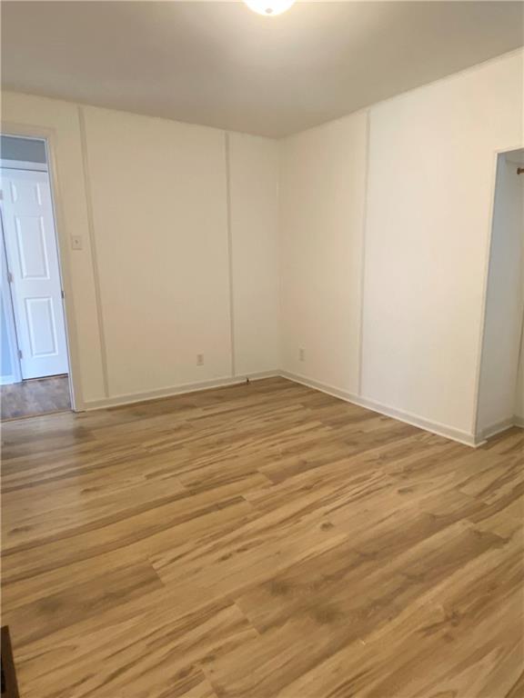 4319 Rte 908 Natrona Heights, PA 15065 - Photo 8 of 24 a view of an empty room with wooden floor