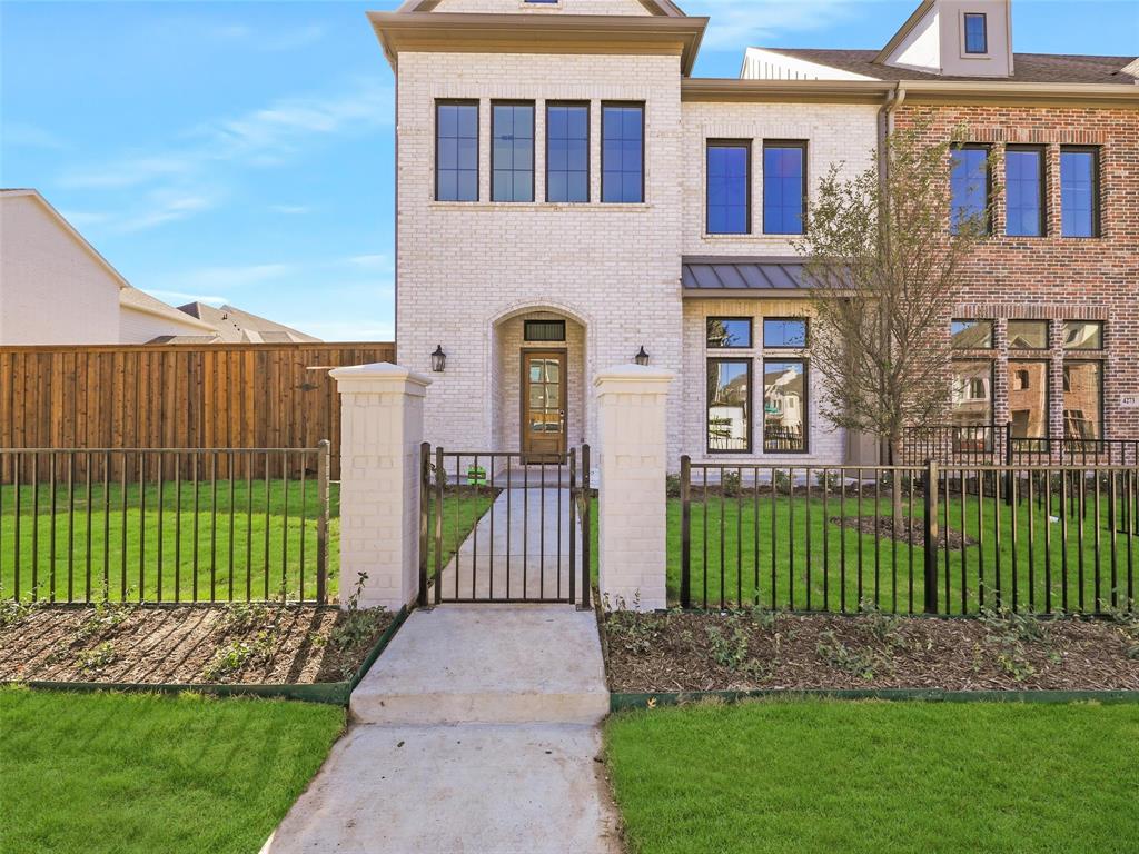4299 Reeder Rdg Way Frisco, TX 75033 - Photo 2 of 30 a front view of a house with a garden and plants