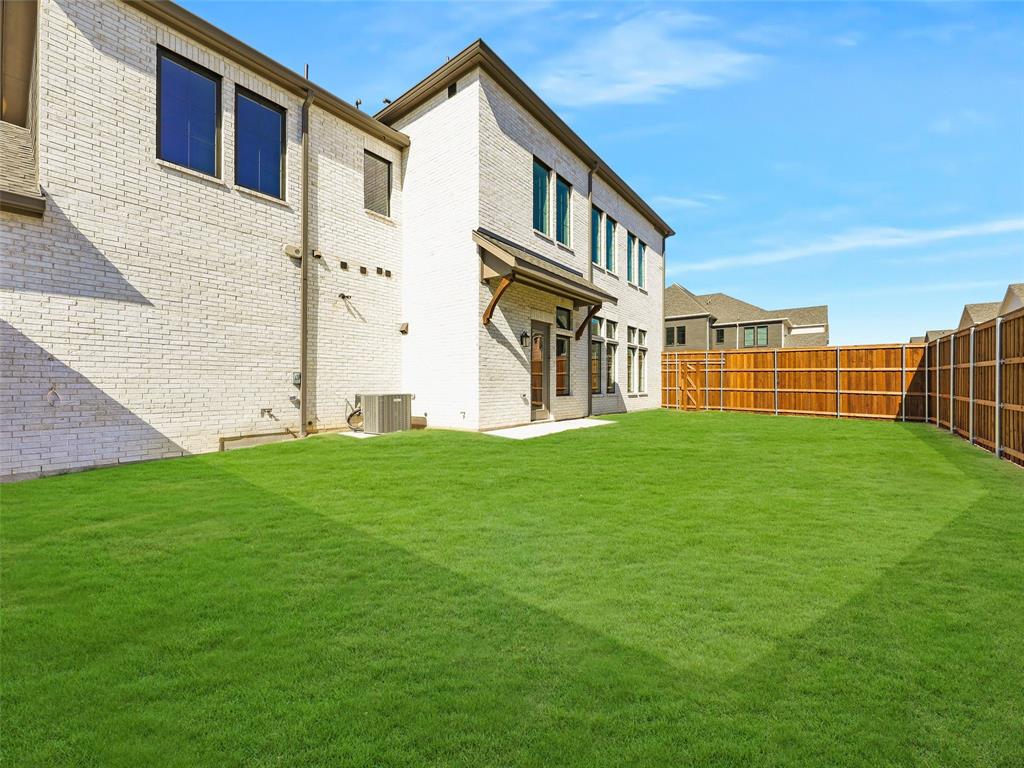 4299 Reeder Rdg Way Frisco, TX 75033 - Photo 30 of 30 a front view of a house with garden