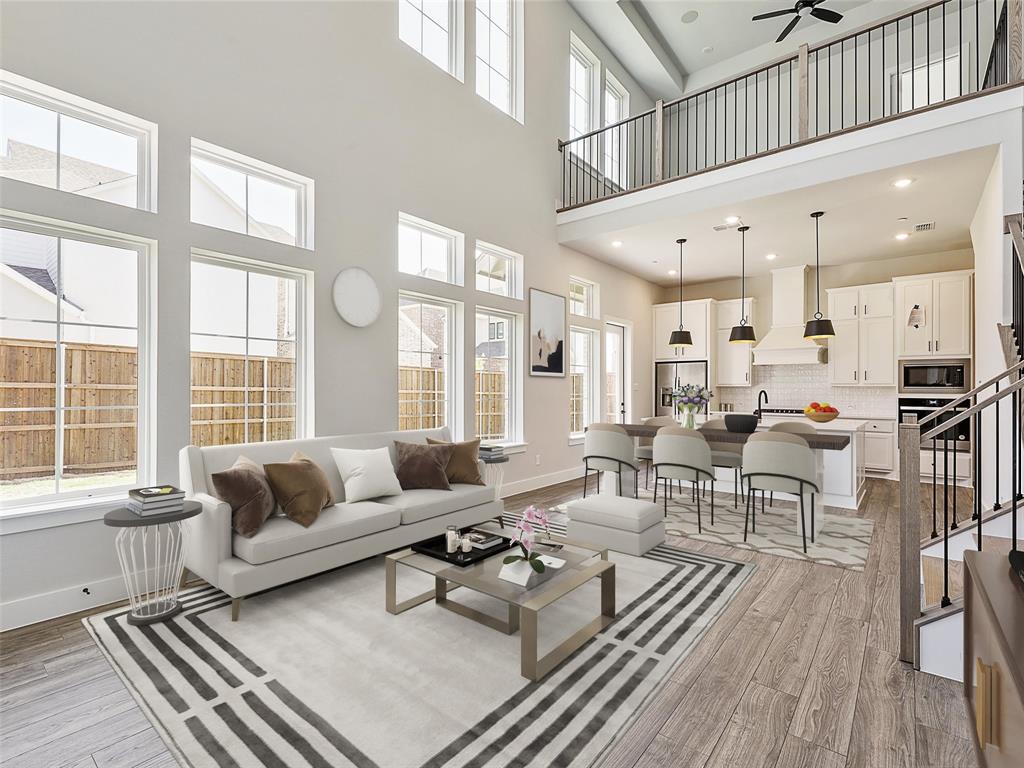 4299 Reeder Rdg Way Frisco, TX 75033 - Photo 3 of 30 a living room with furniture and a large window