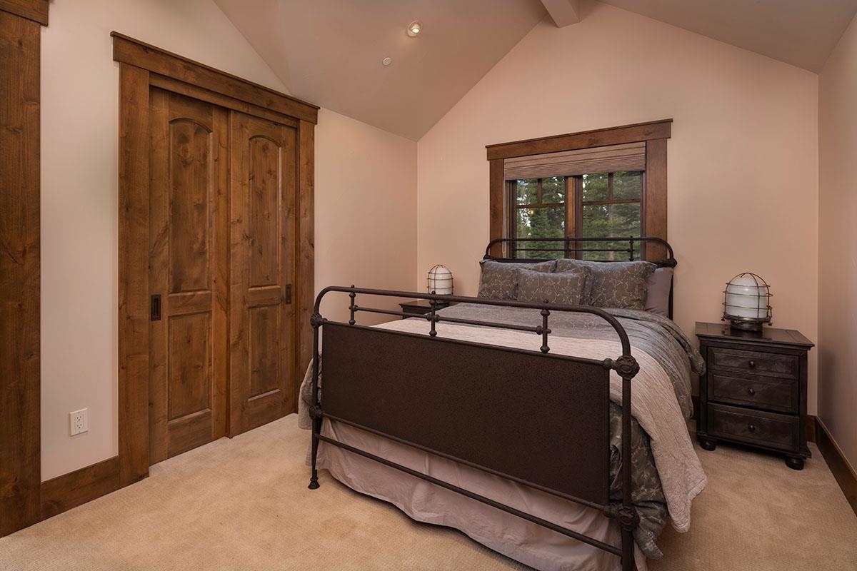 10606 Dutton Court Truckee, CA 96161 - Photo 14 of 22 a bed sitting in a bedroom next to a window