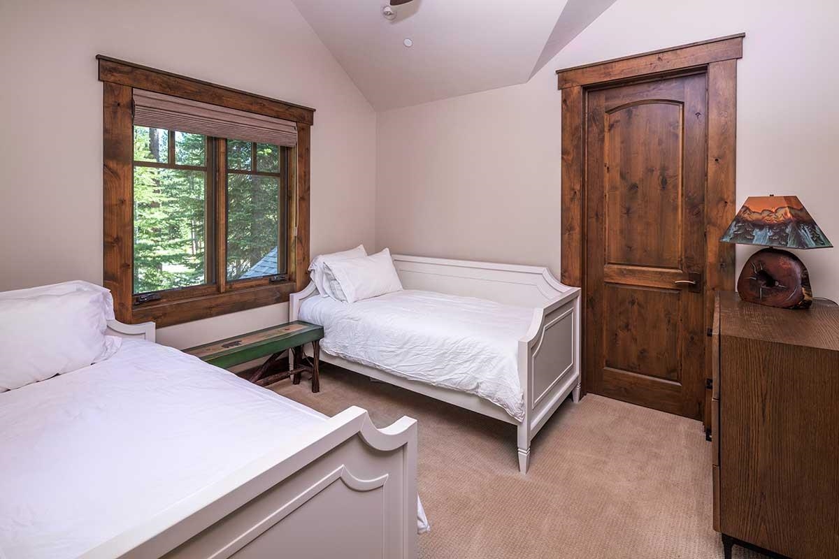 10606 Dutton Court Truckee, CA 96161 - Photo 16 of 22 a bedroom with a bed and a window