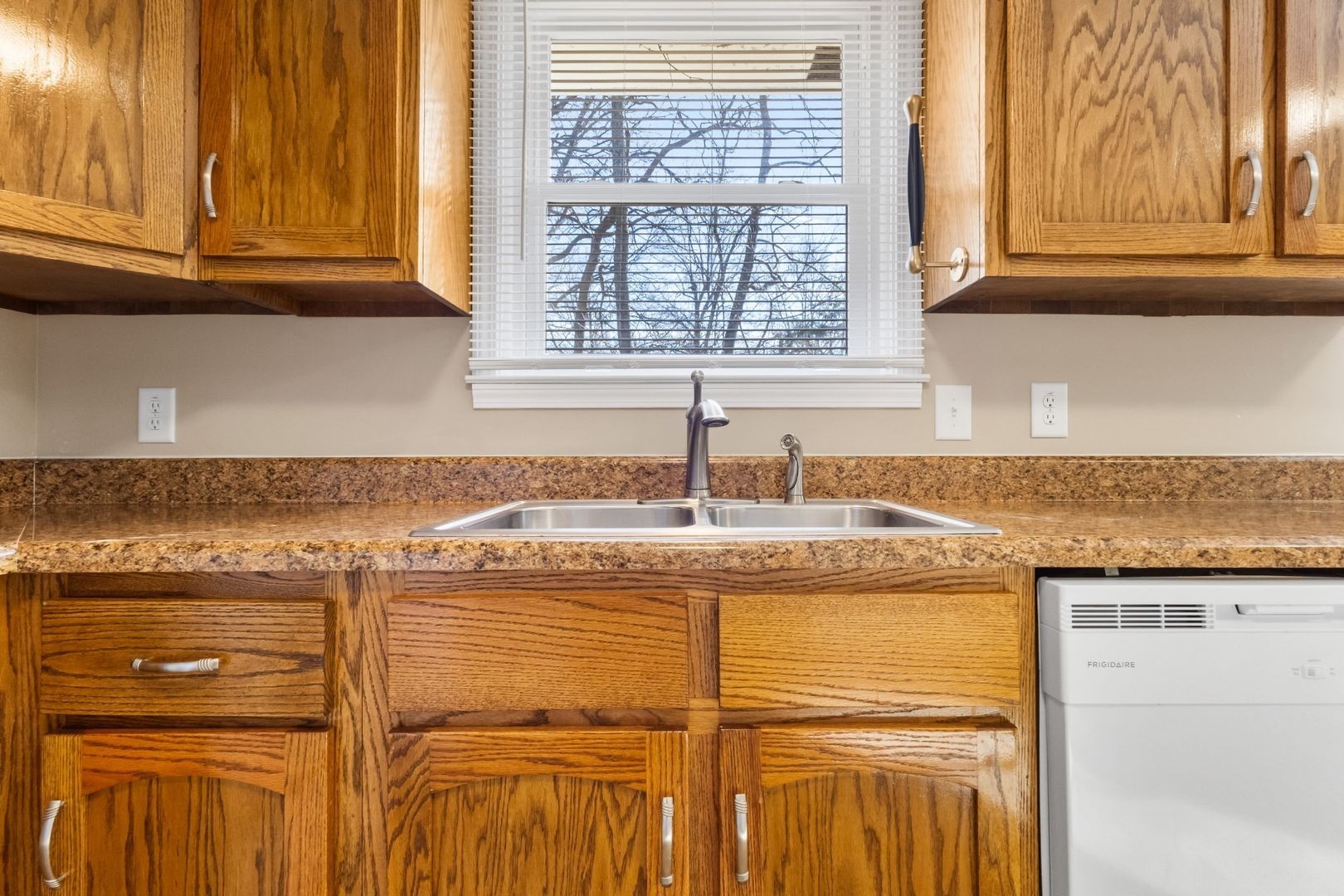 118 Union Hall Road Clarksville, TN 37040 - Photo 9 of 26 a kitchen with granite countertop cabinets sink and window