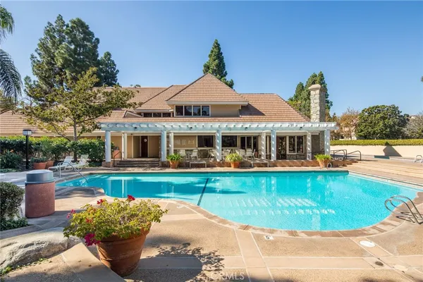 a view of a house with a swimming pool