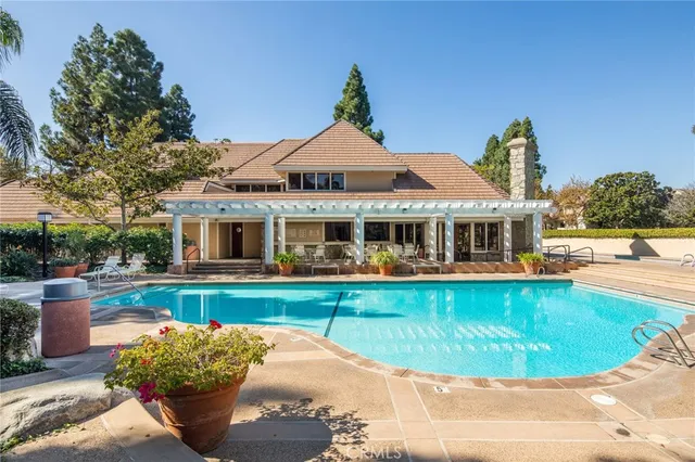 a view of a house with a swimming pool
