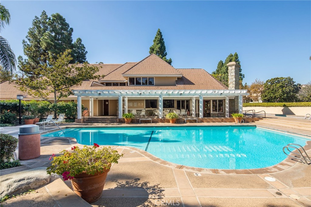2615 Plaza Del Amo, Unit 636 Torrance, CA 90503 - Photo 1 of 22 a view of a house with a swimming pool