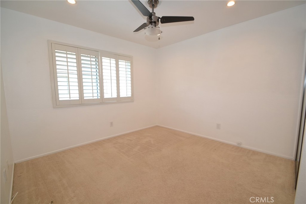 2615 Plaza Del Amo, Unit 636 Torrance, CA 90503 - Photo 12 of 22 an empty room with a window and a fan