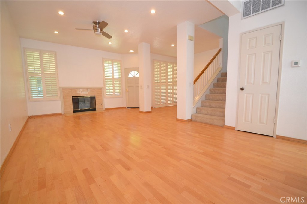 2615 Plaza Del Amo, Unit 636 Torrance, CA 90503 - Photo 3 of 22 an empty room with windows and fireplace