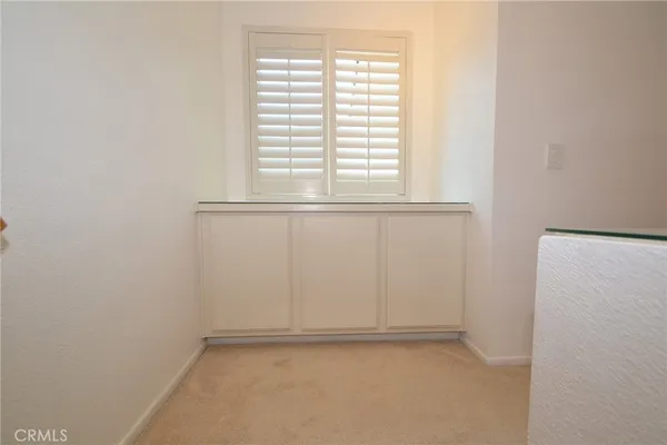 a view of a window in an empty room