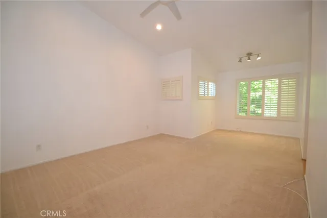 an empty room with windows